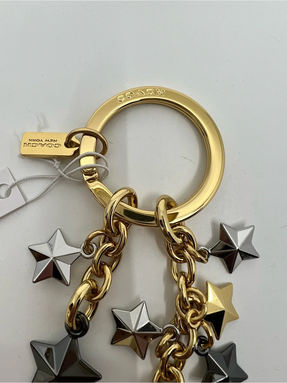 Coach Stars Gold Silver and Black Key Ring and Charm